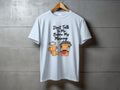 White t-shirt with "Don't Talk To Me Before My Morning" text and cartoon coffee cup.