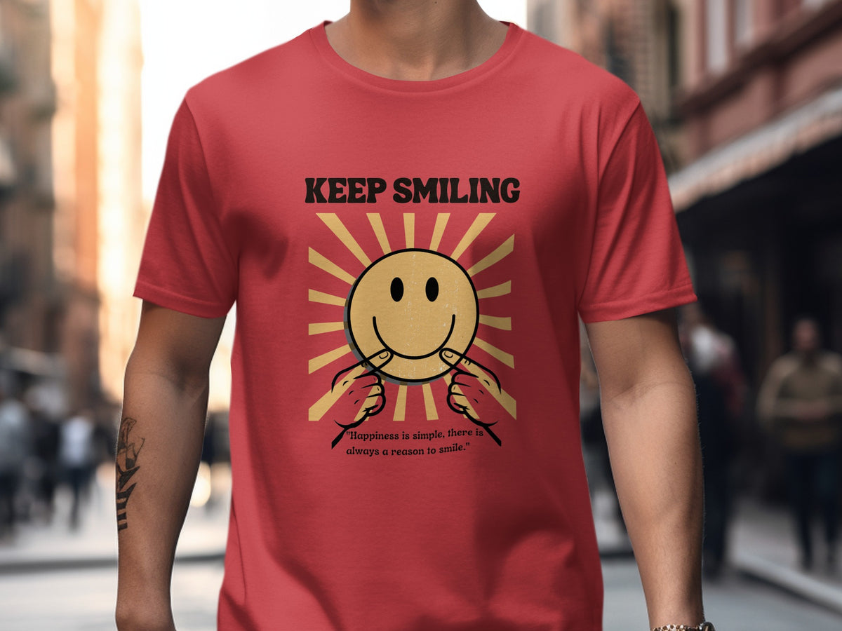 Red t-shirt with "KEEP SMILING" and smiley face graphic and quote.