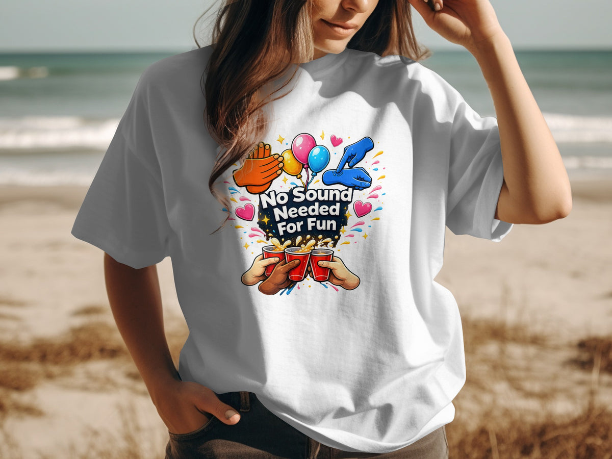 White t-shirt graphic with "No Sound Needed For Fun" text, balloons, and hands.