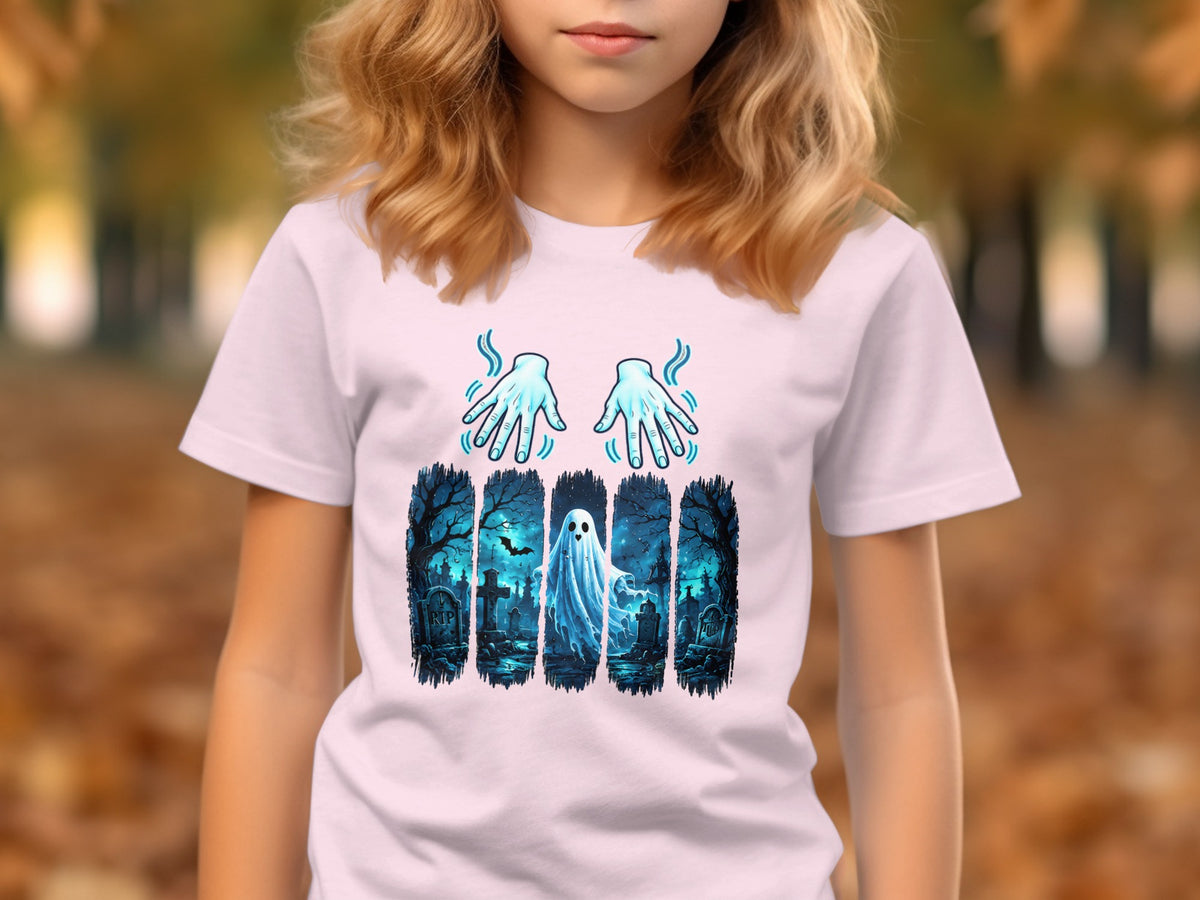 T-shirt with glowing hands and a ghostly graveyard scene design.