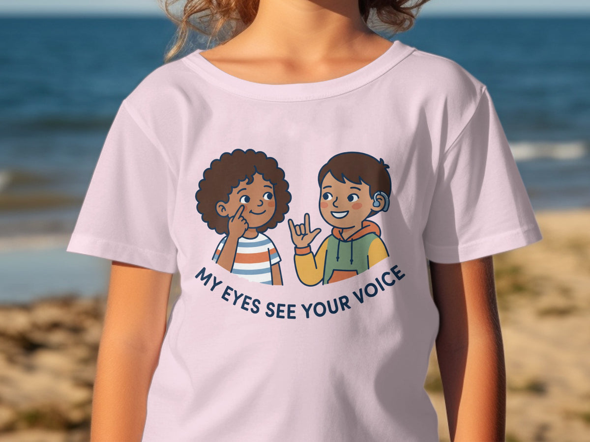 Illustration of two children signing "My eyes see your voice" on a pink t-shirt.