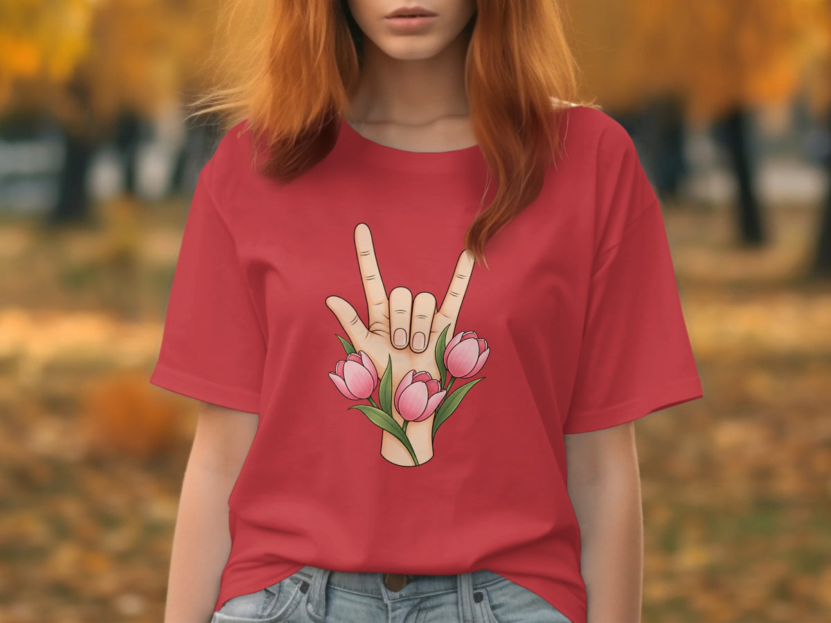 Red t-shirt with hand making rock-on sign and pink tulips graphic.