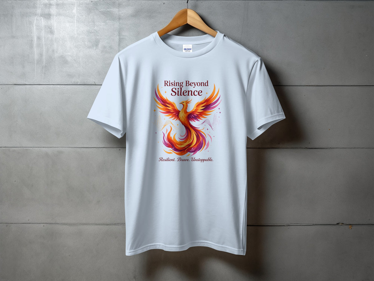 White t-shirt with "Rising Beyond Silence" and a phoenix graphic.