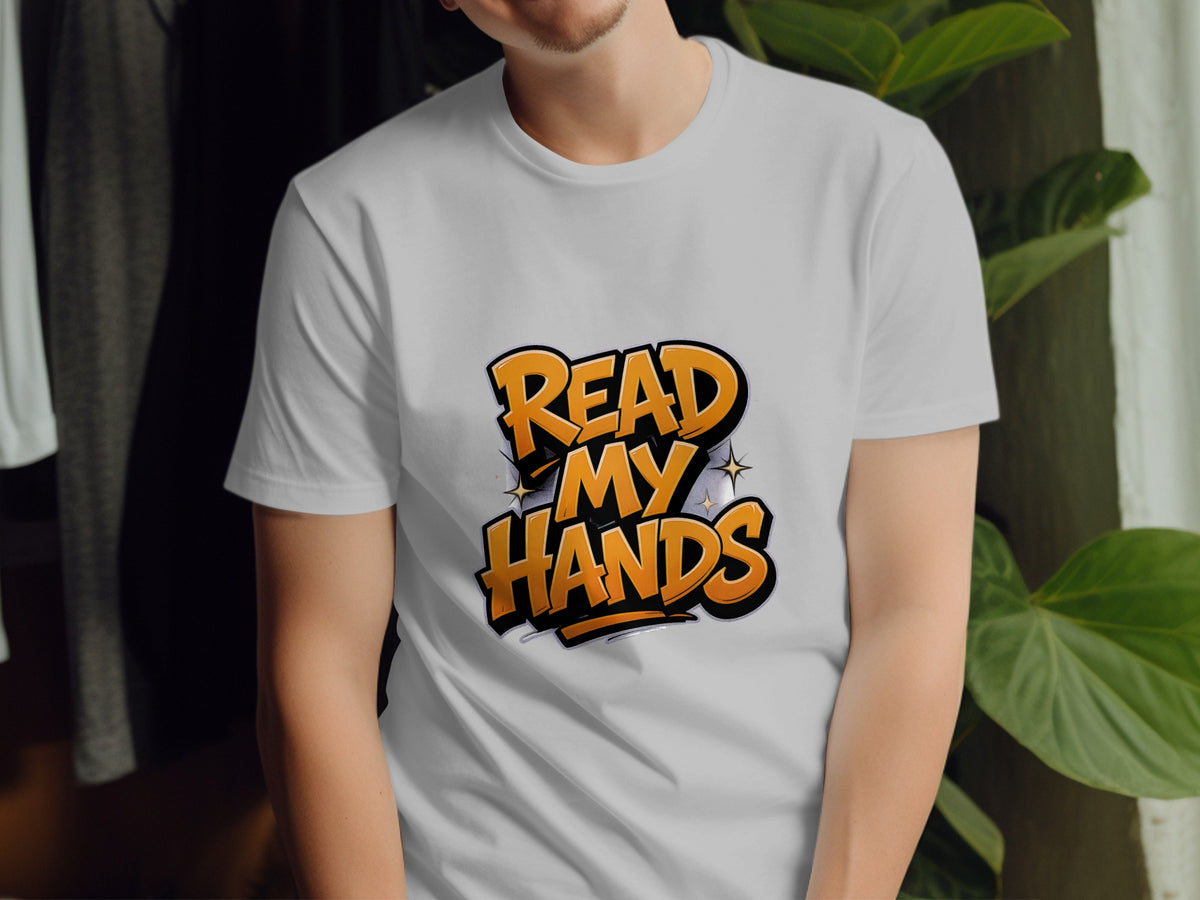 White t-shirt with orange and black comic-style text that reads "READ MY HANDS".