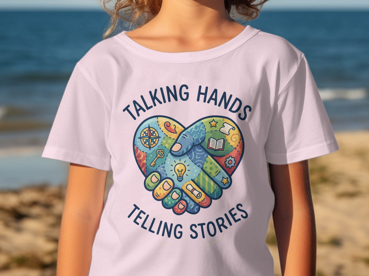 White t-shirt with "Talking Hands Telling Stories" and a heart of hands graphic.