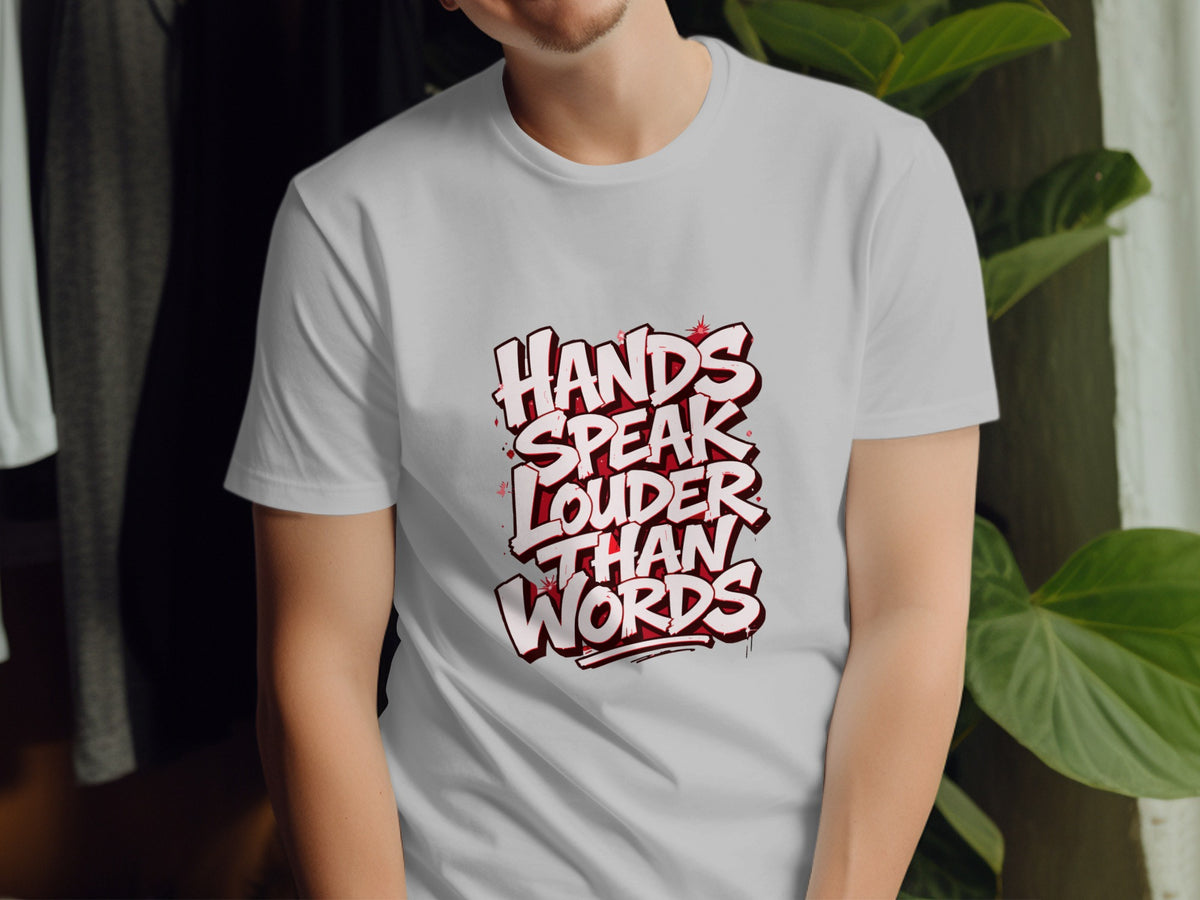 White t-shirt with red and white graffiti text: "HANDS SPEAK LOUDER THAN WORDS".