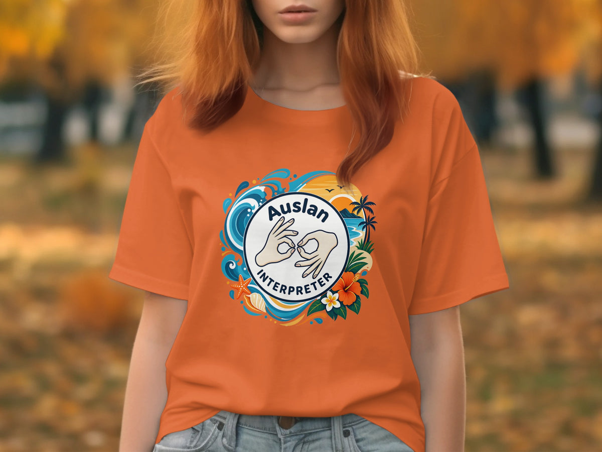 Orange t-shirt with Auslan Interpreter graphic featuring hands, waves, and tropical elements.