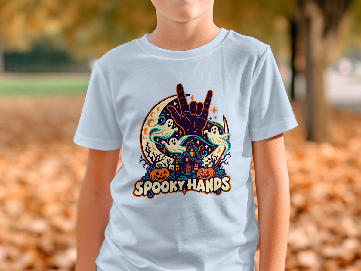 "Spooky Hands" Halloween graphic with rock hand sign, ghosts, haunted house, and pumpkins on a shirt.