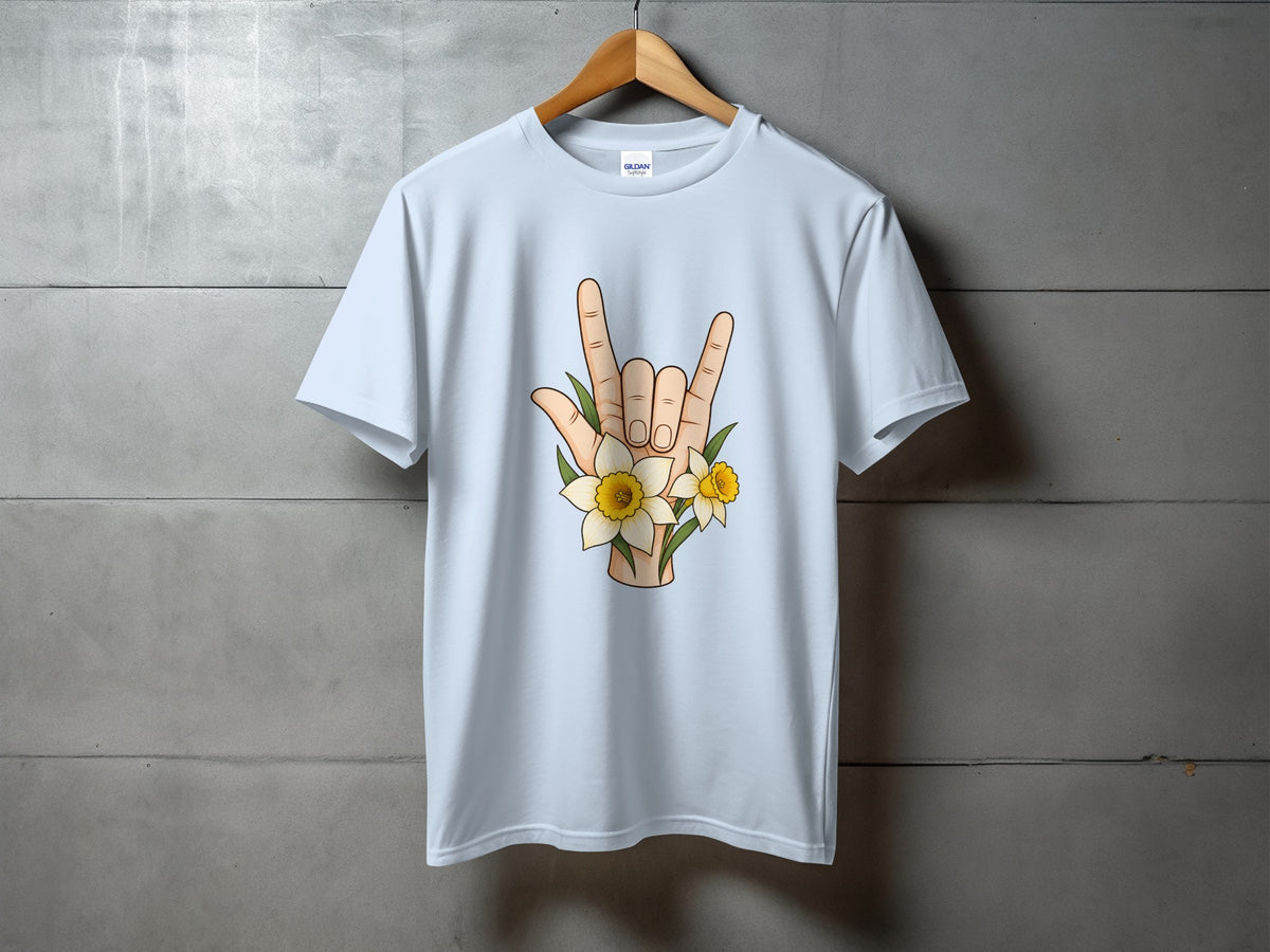 Light blue t-shirt with rock on hand gesture and daffodils graphic.