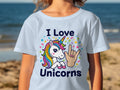 Light blue t-shirt with "I Love Unicorns" and a unicorn with ASL sign language hand.