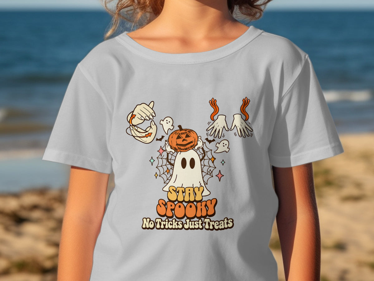 White t-shirt with a ghost, pumpkin, hands, and text saying "STAY SPOOKY No Tricks Just Treats".