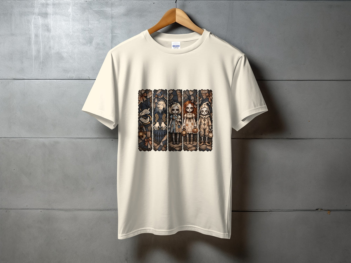 Cream t-shirt with a panel of four Halloween-themed doll illustrations.