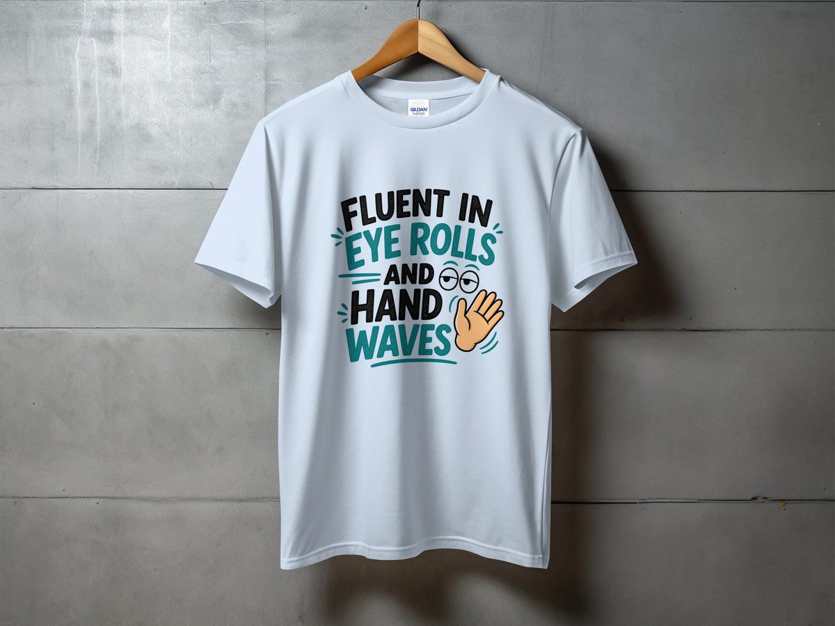 White t-shirt with text "Fluent in Eye Rolls and Hand Waves" and graphic.