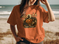 Orange t-shirt with Halloween graphic and "SPOOKY SEASON" text.