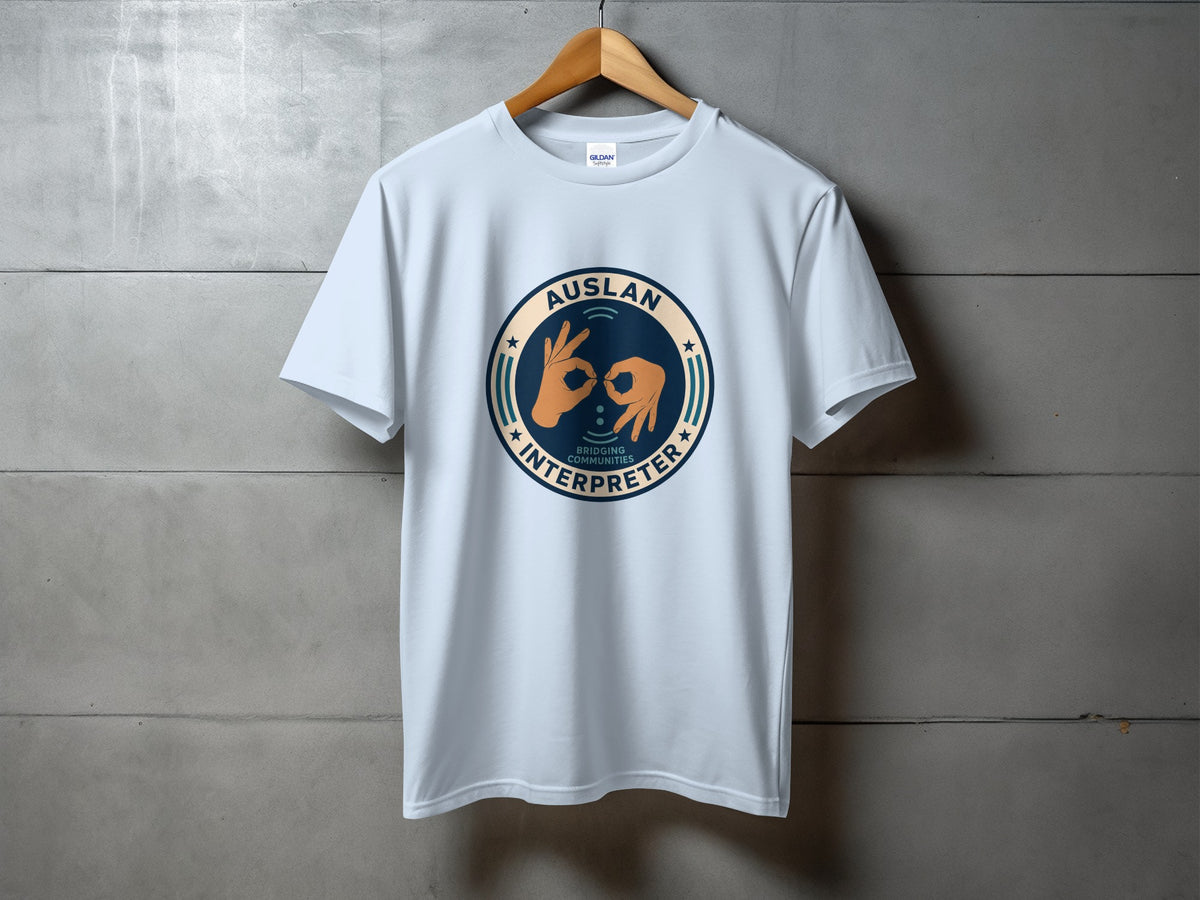 Light blue t-shirt with circular logo featuring hands signing and text "Auslan Interpreter Bridging Communities".