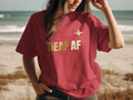 Red t-shirt with gold text "DEAF AF" and a gold star graphic.