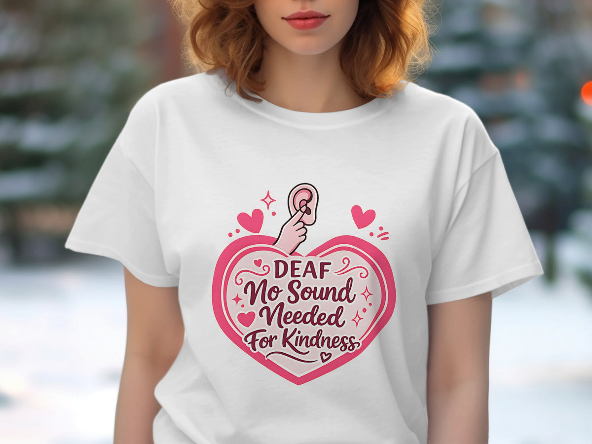 White t-shirt with a pink heart graphic and the text "DEAF No Sound Needed For Kindness".