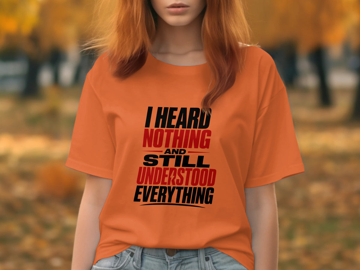 Orange t-shirt with text "I heard nothing and still understood everything".