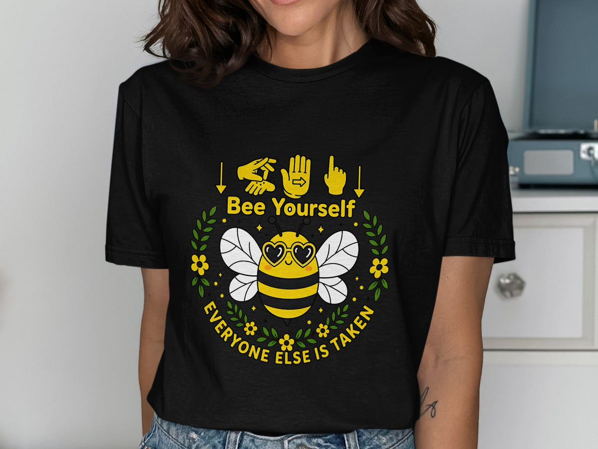 Black t-shirt with a bee graphic and the text "Bee Yourself Everyone Else Is Taken."