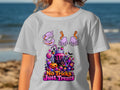 Gray t-shirt with Halloween-themed "No Tricks Just Treats" graphic and candy.