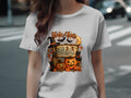 Halloween graphic with pumpkins, witches hat, bats, cats, and "Trick or Treat" text.