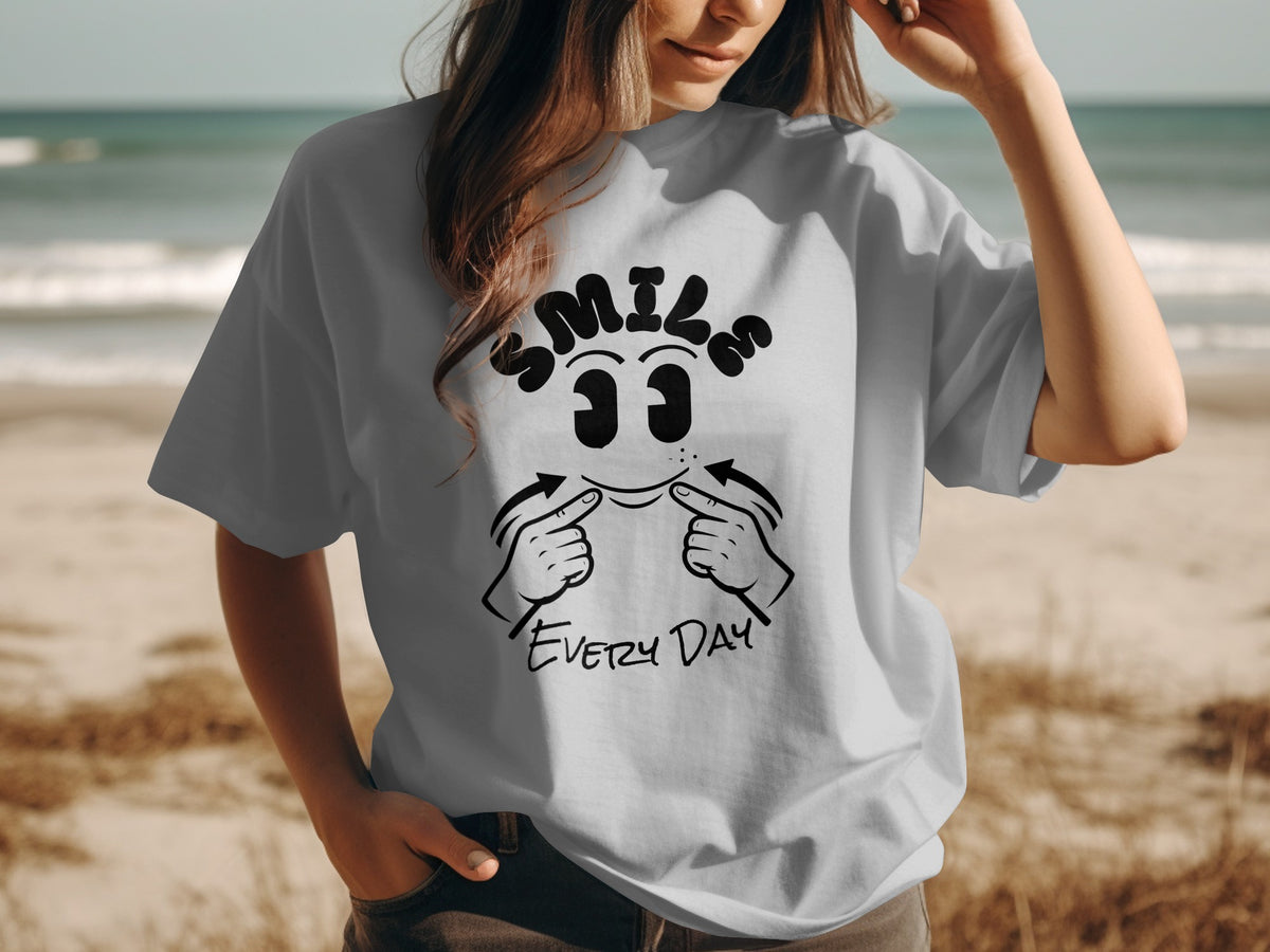 T-shirt with "SMILE EVERY DAY" text and a smiley face graphic.