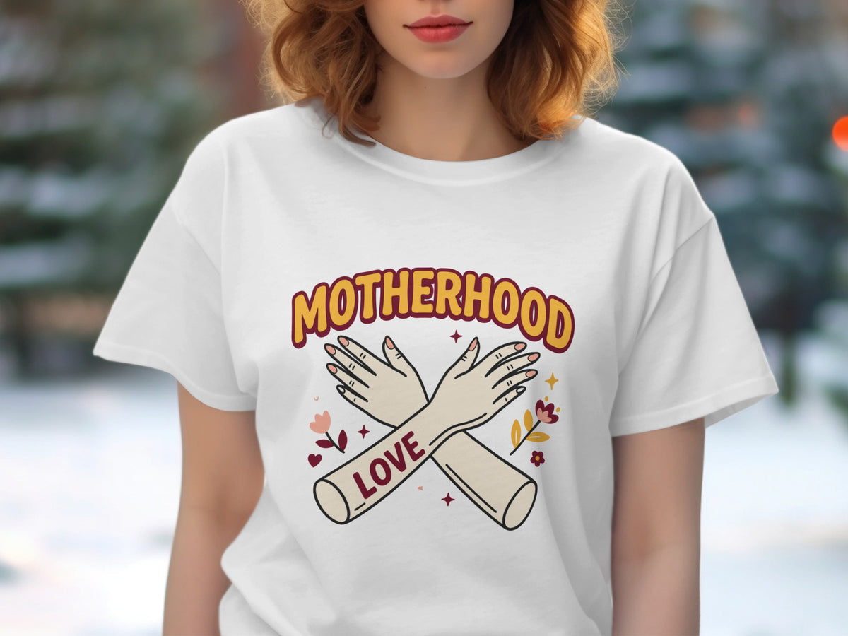 White t-shirt with "Motherhood" text, crossed arms, and "Love" graphic.