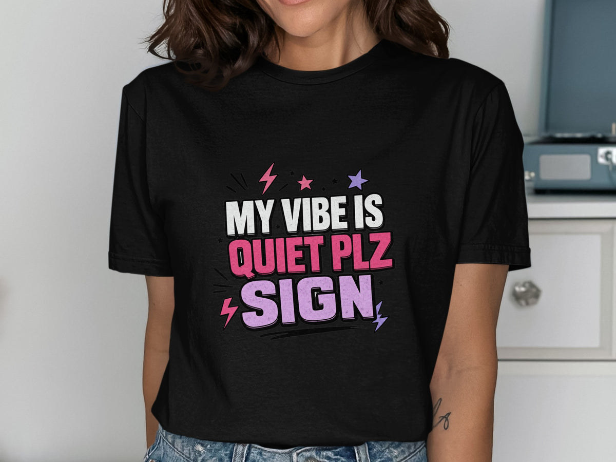 Black t-shirt with text "MY VIBE IS QUIET PLZ SIGN" in pink and purple.