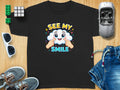 Black t-shirt with smiling cloud graphic saying "SEE MY SMILE"