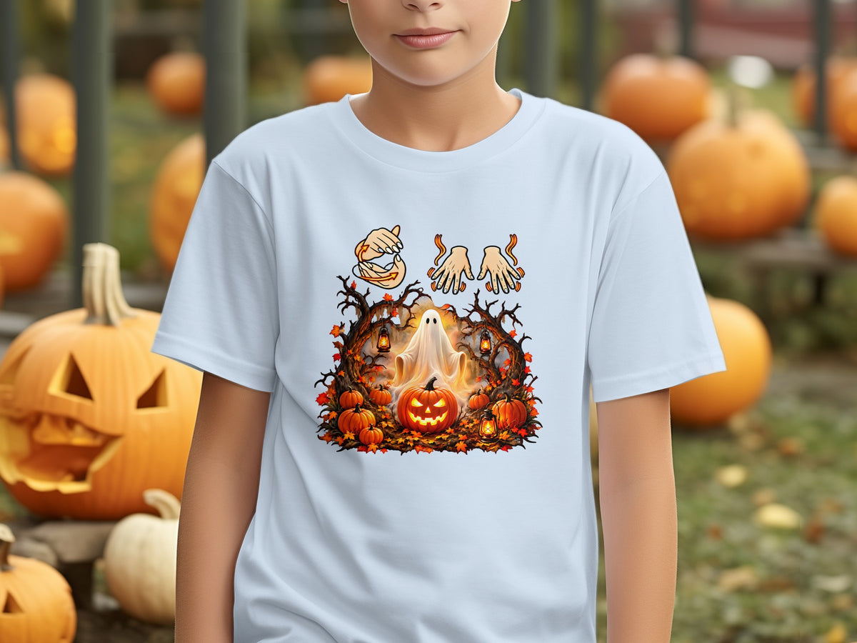 A child wearing a light blue t-shirt featuring a spooky Halloween graphic with pumpkins and a ghost.