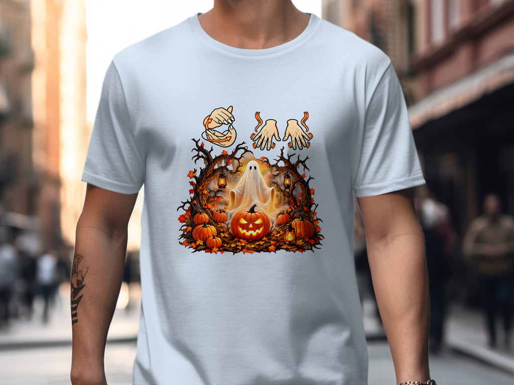 Halloween t-shirt with ghost, jack-o'-lantern, pumpkins, trees, and hands.