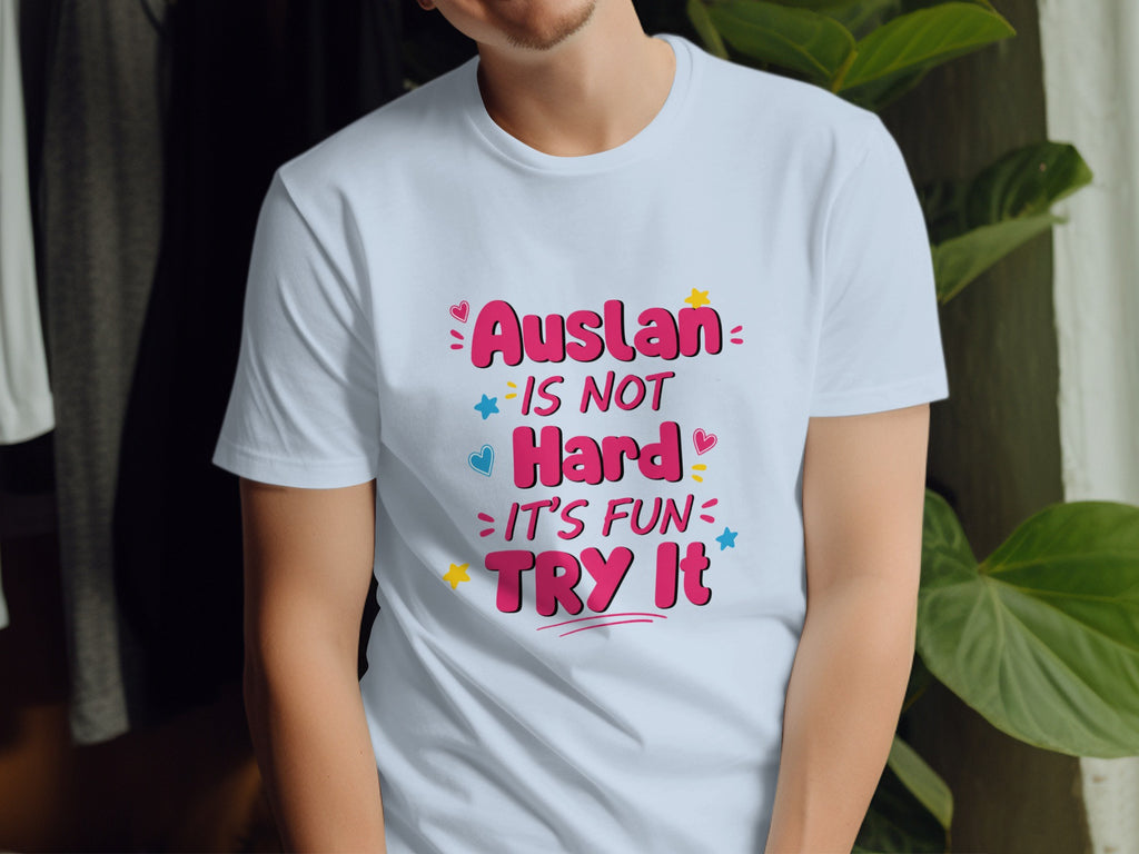 Light blue t-shirt with "Auslan is not hard, it's fun, try it" text.