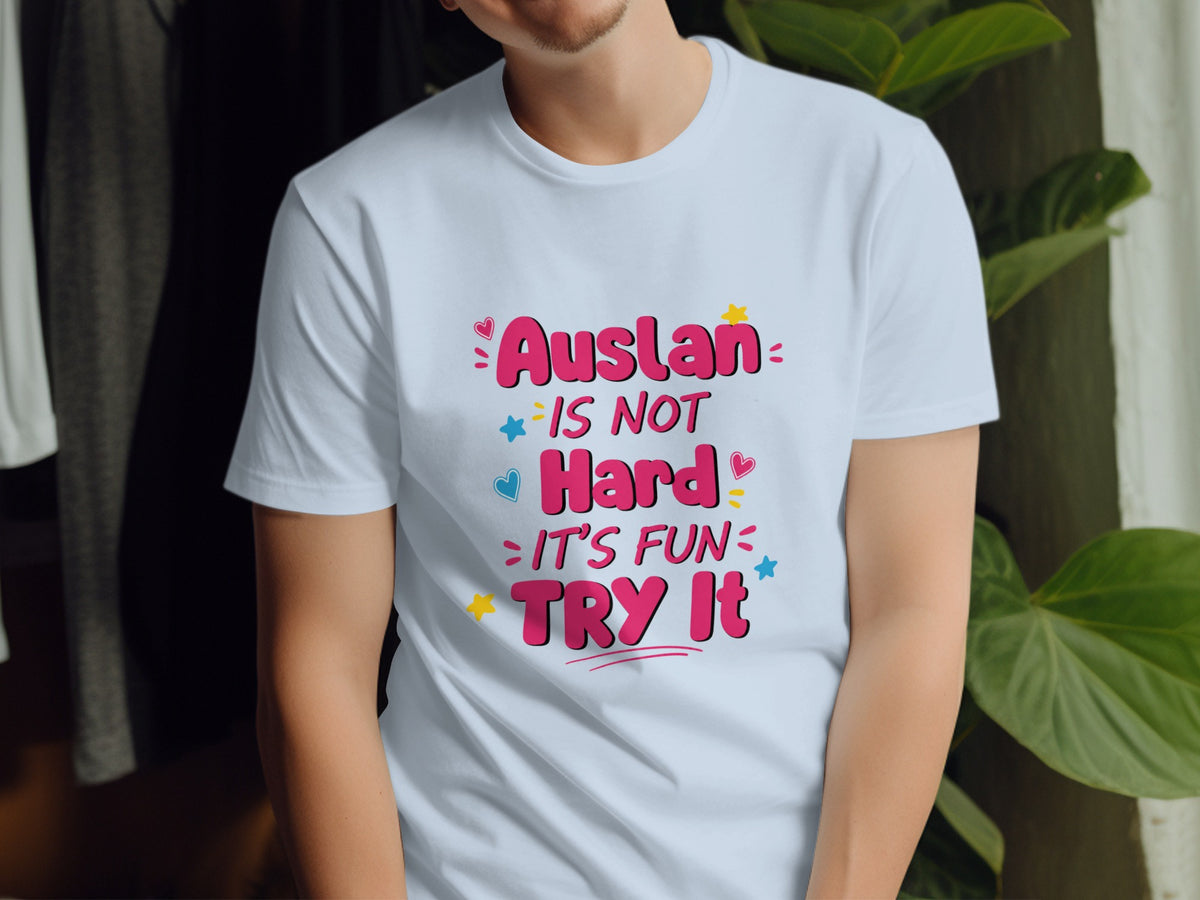 Light blue t-shirt with "Auslan is not hard, it's fun, try it" text.