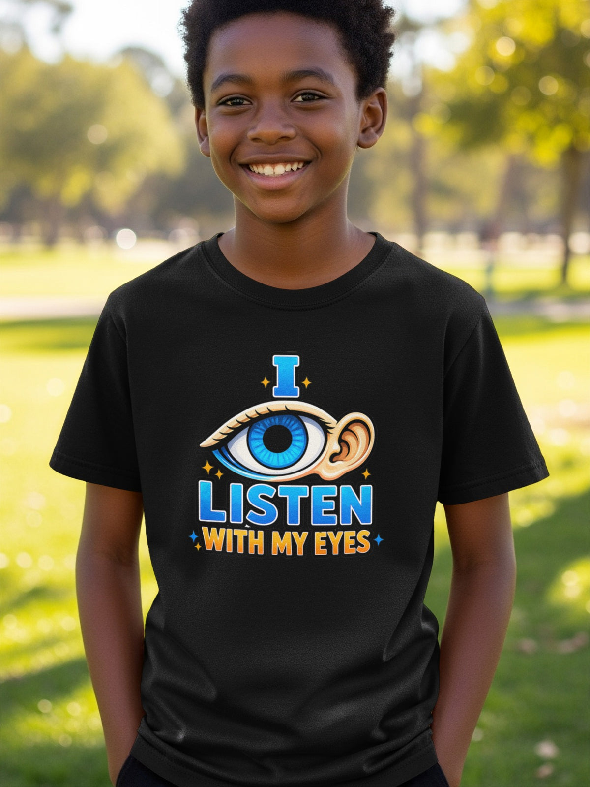 Black t-shirt with blue text "I LISTEN WITH MY EYES" and eye graphic.
