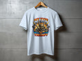 Light blue t-shirt with "MY TYPE OF THERAPY" graphic featuring a motorcycle and hand gesture.