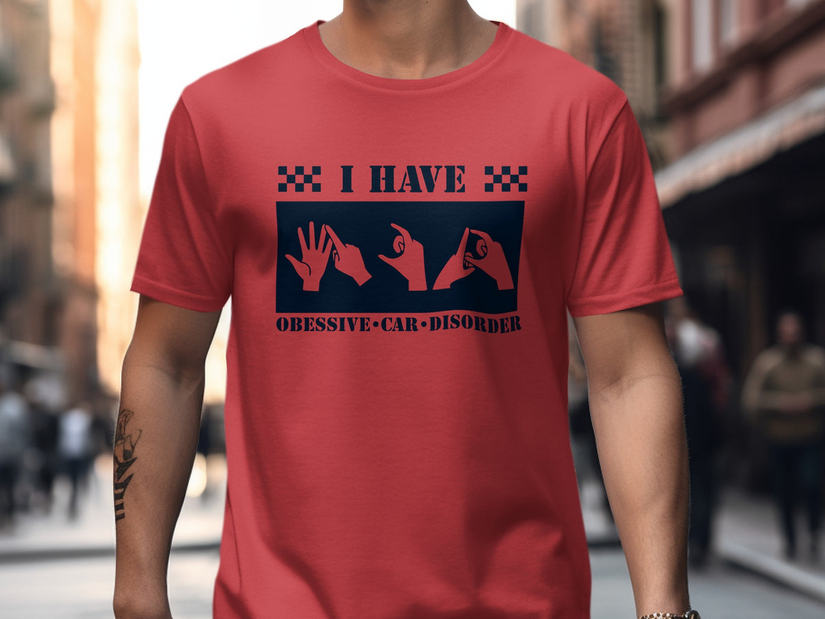 Red t-shirt with text "I HAVE" and hand signs for "CAR DISORDER".