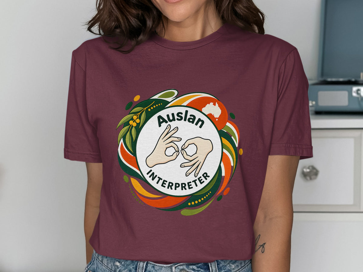 Maroon t-shirt with "Auslan Interpreter" circular graphic featuring hands signing.
