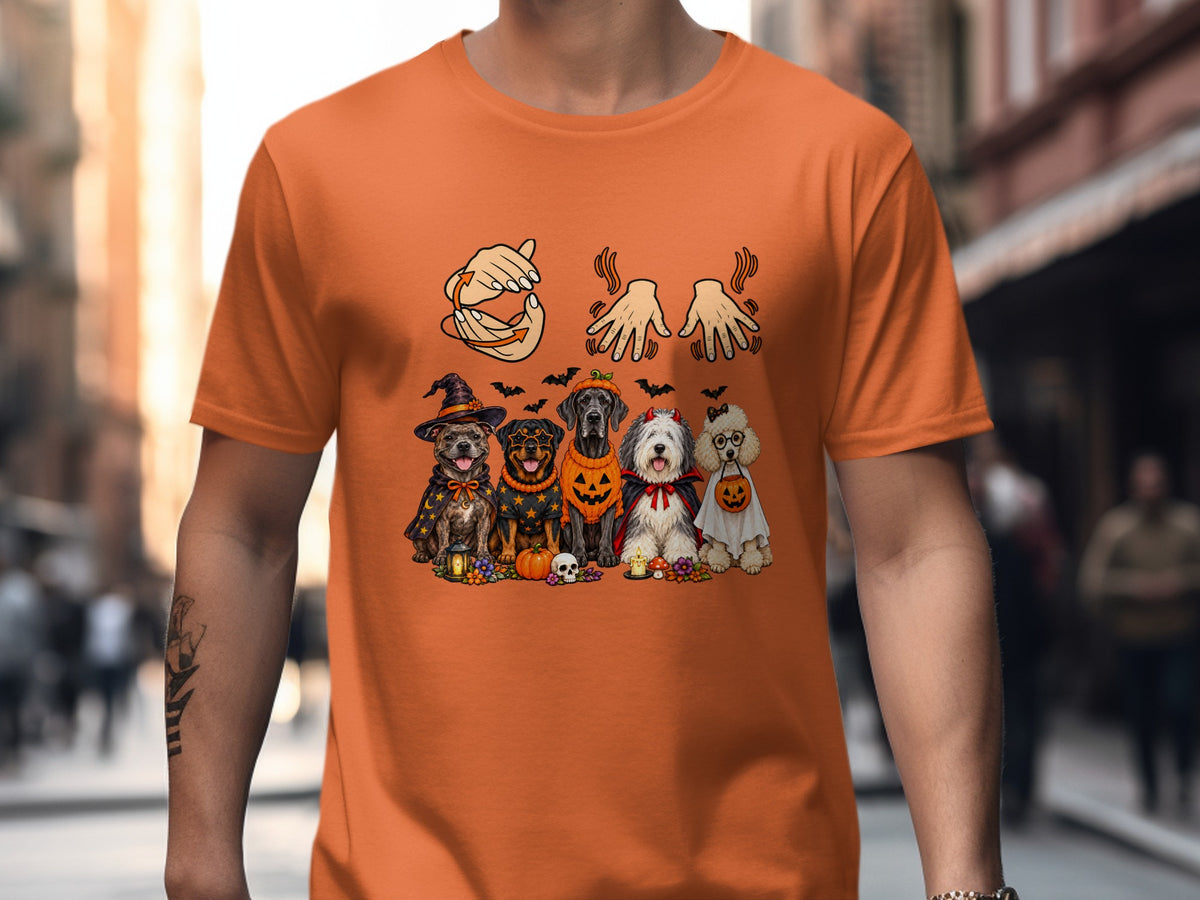 Five dogs in Halloween costumes with decorative pumpkins, bats, and candles.