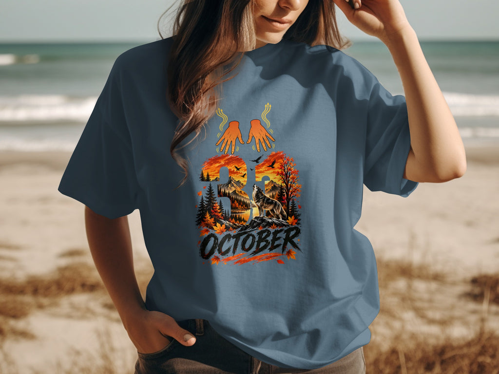 T-shirt with Halloween graphic: wolf, mountains, autumn trees, and "31 OCTOBER" text.