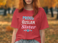 Red t-shirt with "PROUD AUSLAN SISTER" text and floral design.