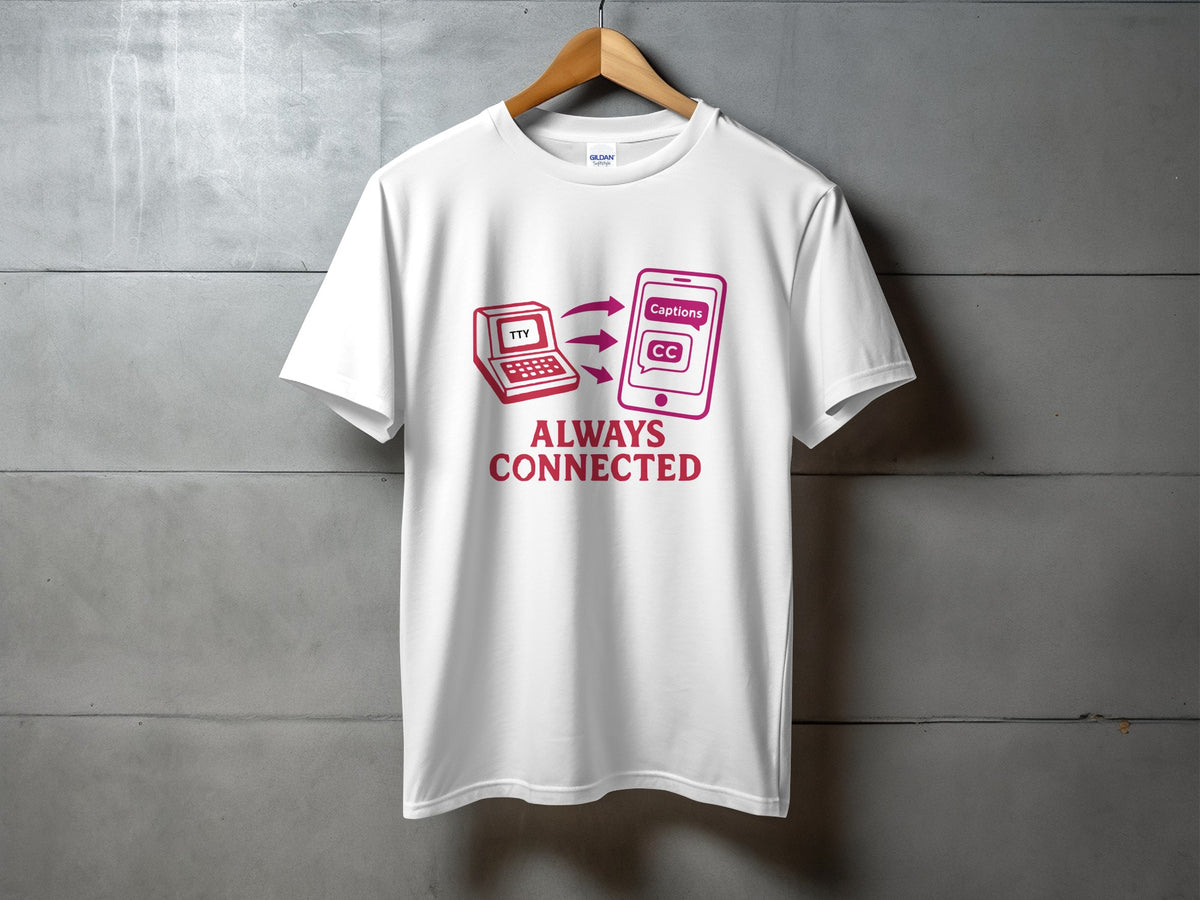 White t-shirt with pink graphic of laptop labeled TTY connecting to phone with captions and CC.