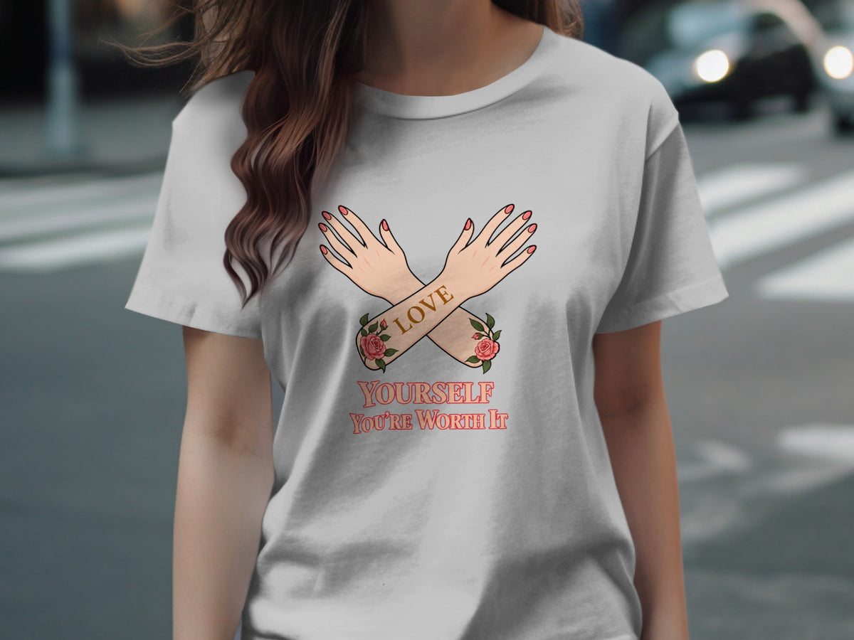 T-shirt with crossed arms and roses, text reads "LOVE YOURSELF YOU'RE WORTH IT".
