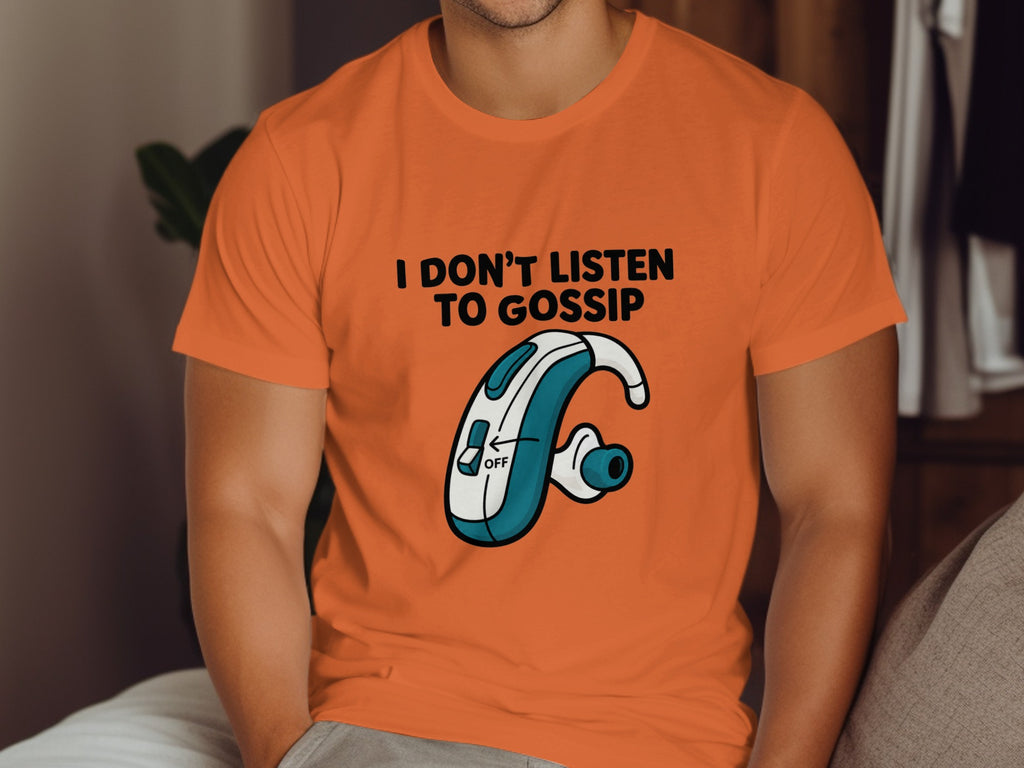 Orange t-shirt with "I DON'T LISTEN TO GOSSIP" and cartoon hearing aid graphic.