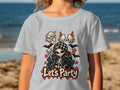 Skeleton girl with hat and jacket saying "Let's Party" with bats and stars.