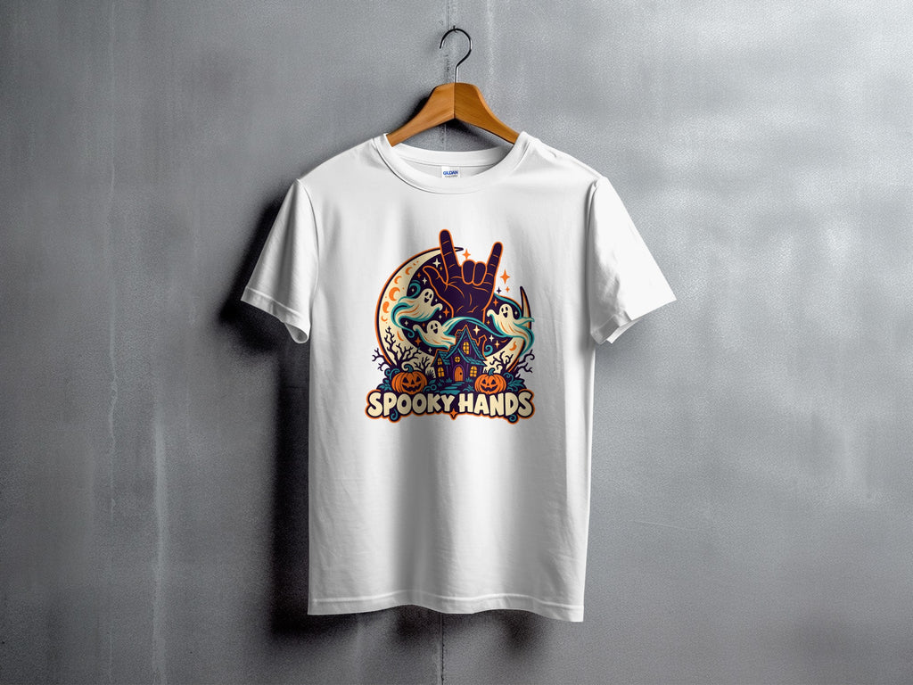 White t-shirt with "Spooky Hands" Halloween graphic featuring pumpkins, ghosts, and a moon.