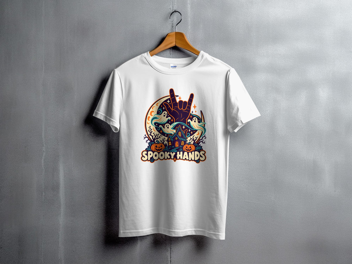 White t-shirt with "Spooky Hands" Halloween graphic featuring pumpkins, ghosts, and a moon.