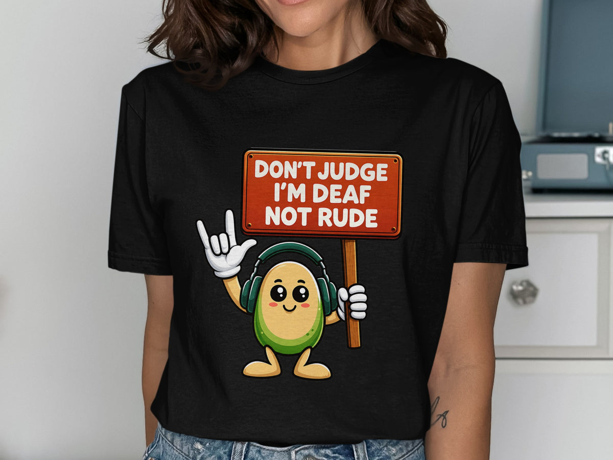 Cartoon avocado with headphones holds sign "Don't Judge I'm Deaf Not Rude".