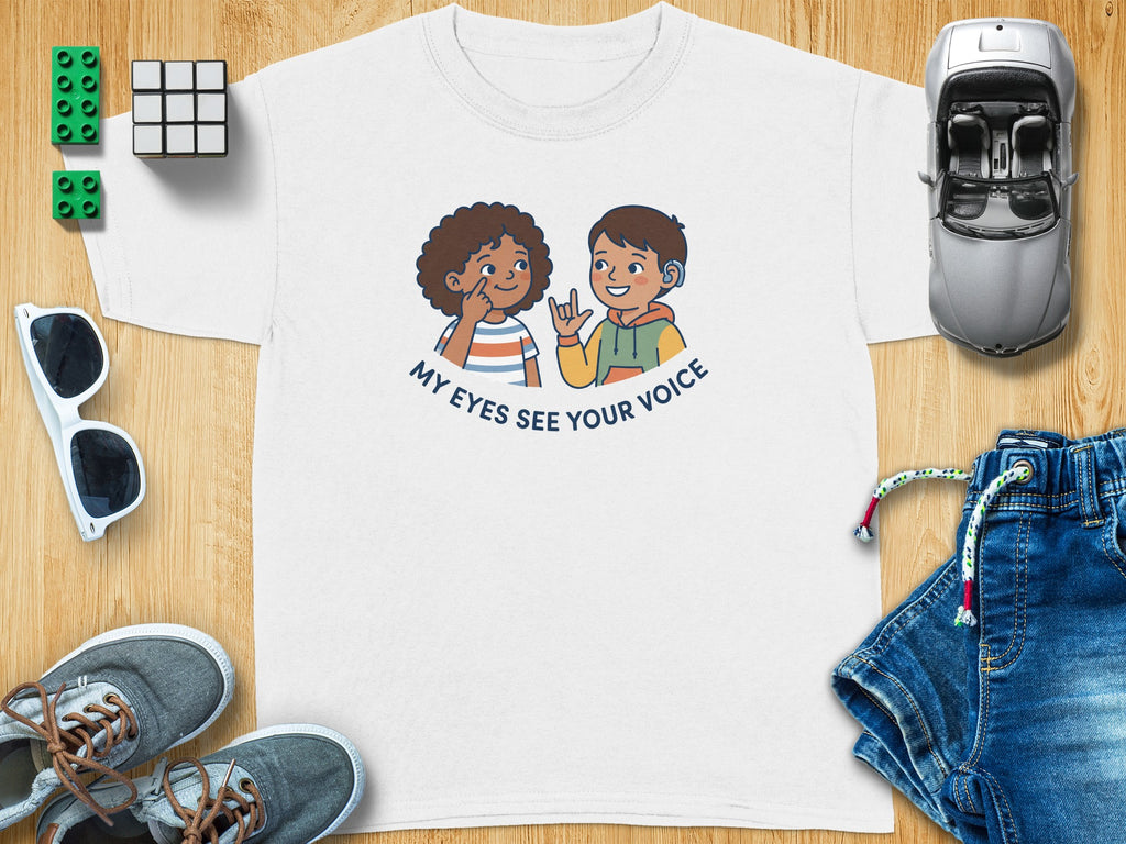 T-shirt graphic of two children, one signing "My eyes see your voice."