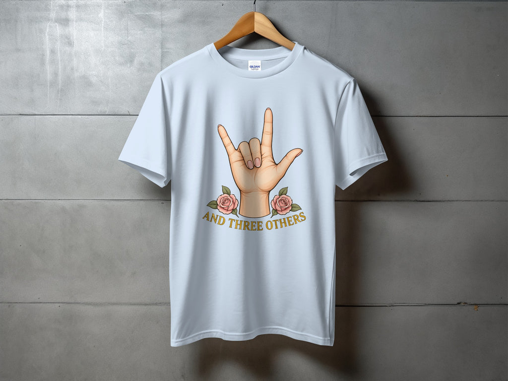 Light blue t-shirt with hand gesture and text "AND THREE OTHERS".