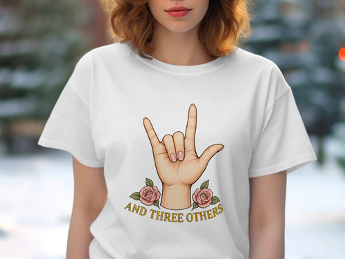 White t-shirt with hand sign, two pink roses, and text "AND THREE OTHERS".